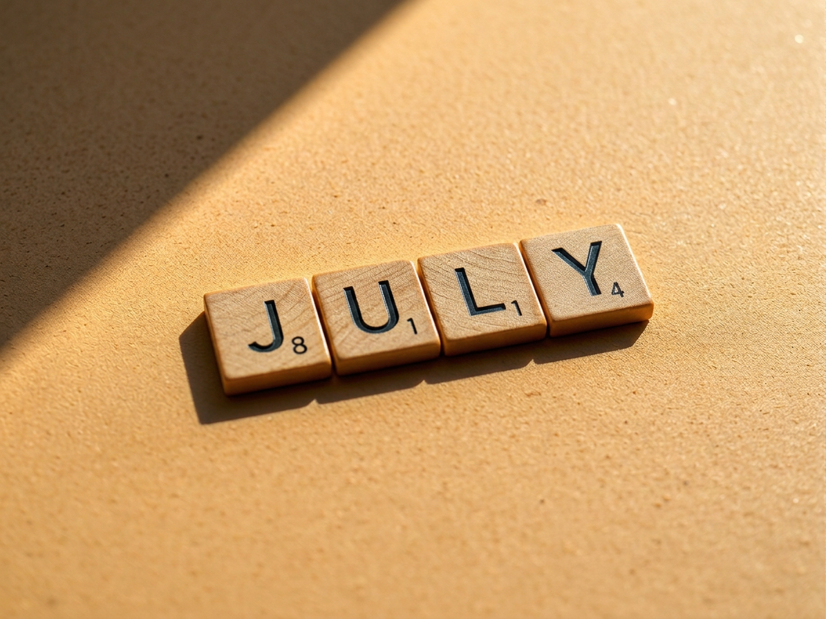 Scrabble tiles spelling the word MAY with scores 3, 1, and 4