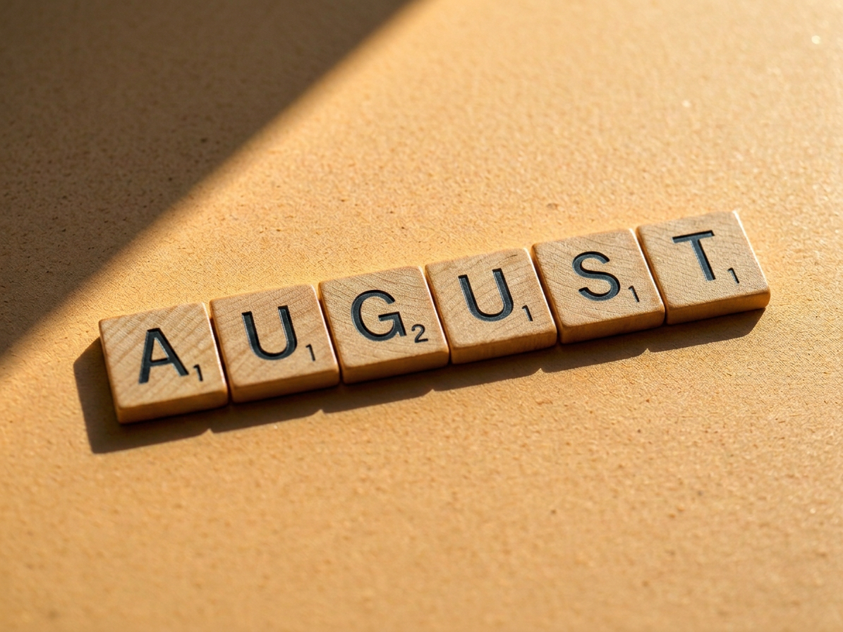 Scrabble tiles spelling the word MAY with scores 3, 1, and 4